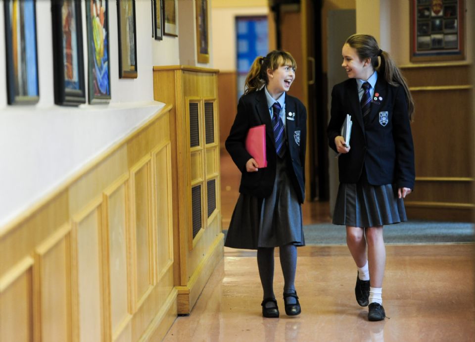 Girls talking in school uniform